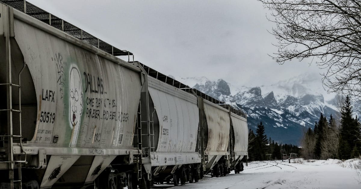 Freight train moving goods across Canada